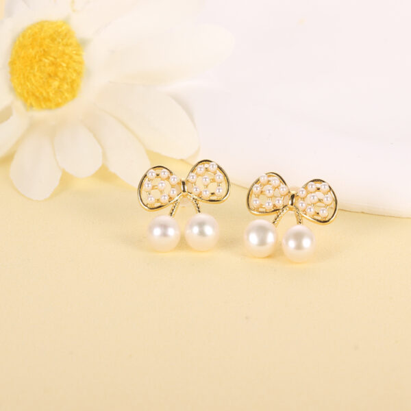 Twinkle Bow Treasure Earrings - Image 2