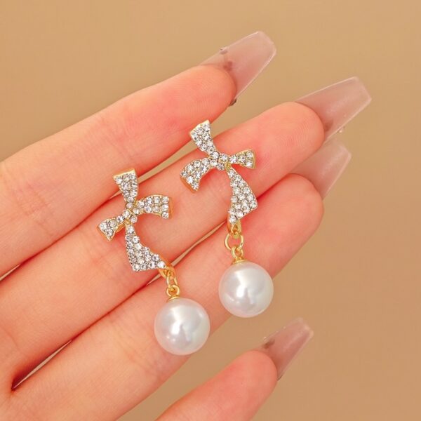 Radiant Ribbon Pearl Earrings - Image 2